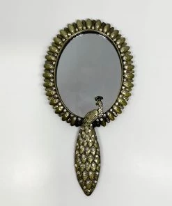 Scout House Timeless Aged Handheld Peacock Mirror. Gifts